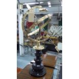 ARMILLARY SPHERE, plated on black base, 89cm H.