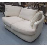 SOFA, two seater, in cream leather and cream fabric on metal supports, 172cm long.