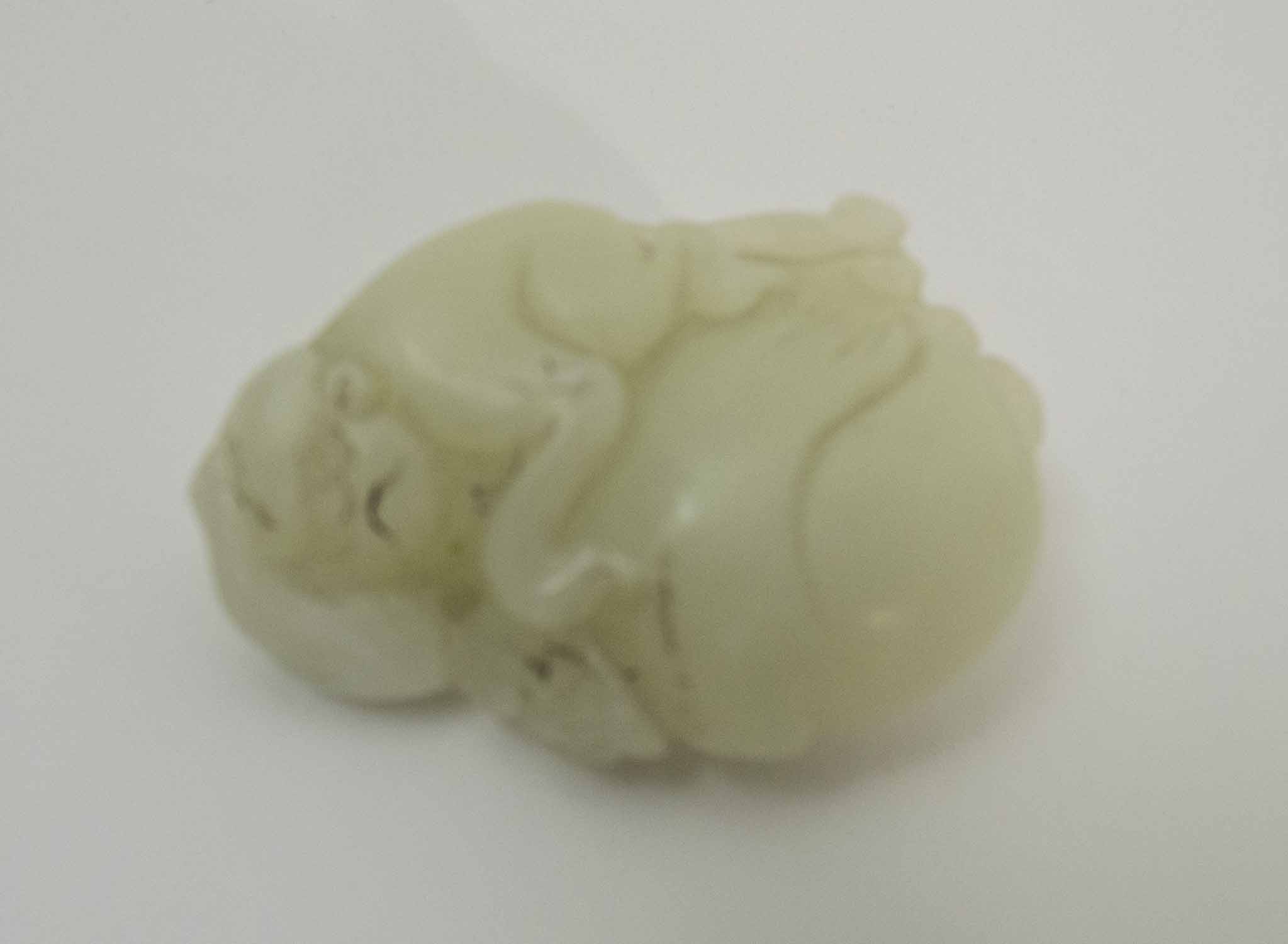 A CHINESE DALE CELADON COLOURED JADE MONKEY AND GOURD and a greyish coloured Jade recumbant lion, - Image 4 of 4