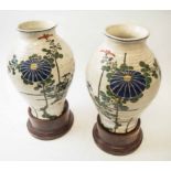 JAPANESE SATSUMA VASES, a large pair, early 20th century, with stands, 39cm H.