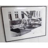 BLACK AND WHITE PHOTOPRINT, Brigitte Bardot in car, overall 61cm H x 81cm W.