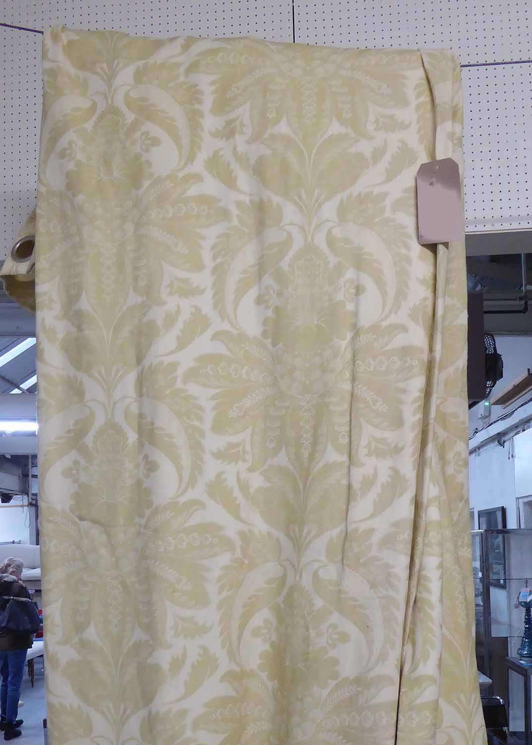 CURTAINS, a pair, lined and interlined with eye rings to top in an olive and cream floral fabric,