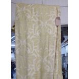 CURTAINS, a pair, lined and interlined with eye rings to top in an olive and cream floral fabric,