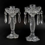 A PAIR OF BOXED WATERFORD CUT GLASS, lustres each with eight faceted drops,