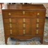 CHEST, Regency mahogany having a full width drawer above nine short drawers and bracket supports,