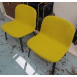 MUUTO LOUNGE CHAIRS, a pair, in mustard upholstery on ebonised supports, designed by Mika Tolvanen,