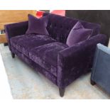 SOFA, of small proportions in purple upholstery with two scatter cushions, 140cm x 85cm x 75cm.