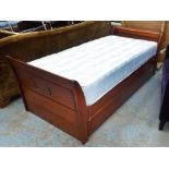 BERNARD SIGUIER TRUNDLE BED, mahogany with single mattress, 3ft W x 220cm L.