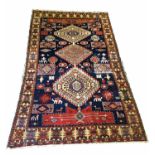 FINE ANTIQUE CAUCASIAN CARPET, 220cm x 153cm.