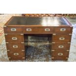 CAMPAIGN STYLE DESK, yew wood and brass bound with nine drawers and tooled black leather,