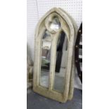 GOTHIC STYLE MIRRORS, a pair in reconstituted stone, 78cm H.
