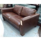 SOFA, two seater in brown leather, 155cm L x 93cm W x 75cm H.
