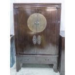 CHINESE MARRIAGE CABINET, elm with a pair of doors, 108cm x 173cm H x 60cm.