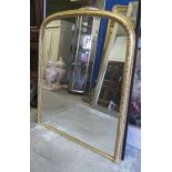 OVERMANTEL MIRROR, Victorian with an arched decorative gilt frame, 115cm W x 133cm H.