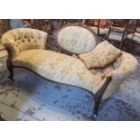 SOFA, mid Victorian walnut with a carved decorative showframe,