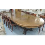 DINING TABLE, of extra large proportions with an oval top on swept,