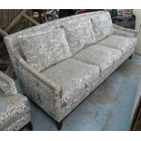 SOFA, three seater, in a Zoffani silvered floral fabric on blue ground on square supports, 219cm L.