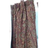 CURTAINS, a pair, in a brown floral design lined and interlined, each 196cm W gathered x 260cm drop.