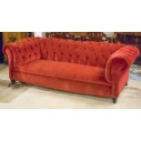 CHESTERFIELD SOFA, Victorian framed with scarlet deep button upholstered seat, back and arms,