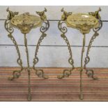 JARDINIERE STANDS, a pair, early 20th century, brass with pierced tops on tripod supports,