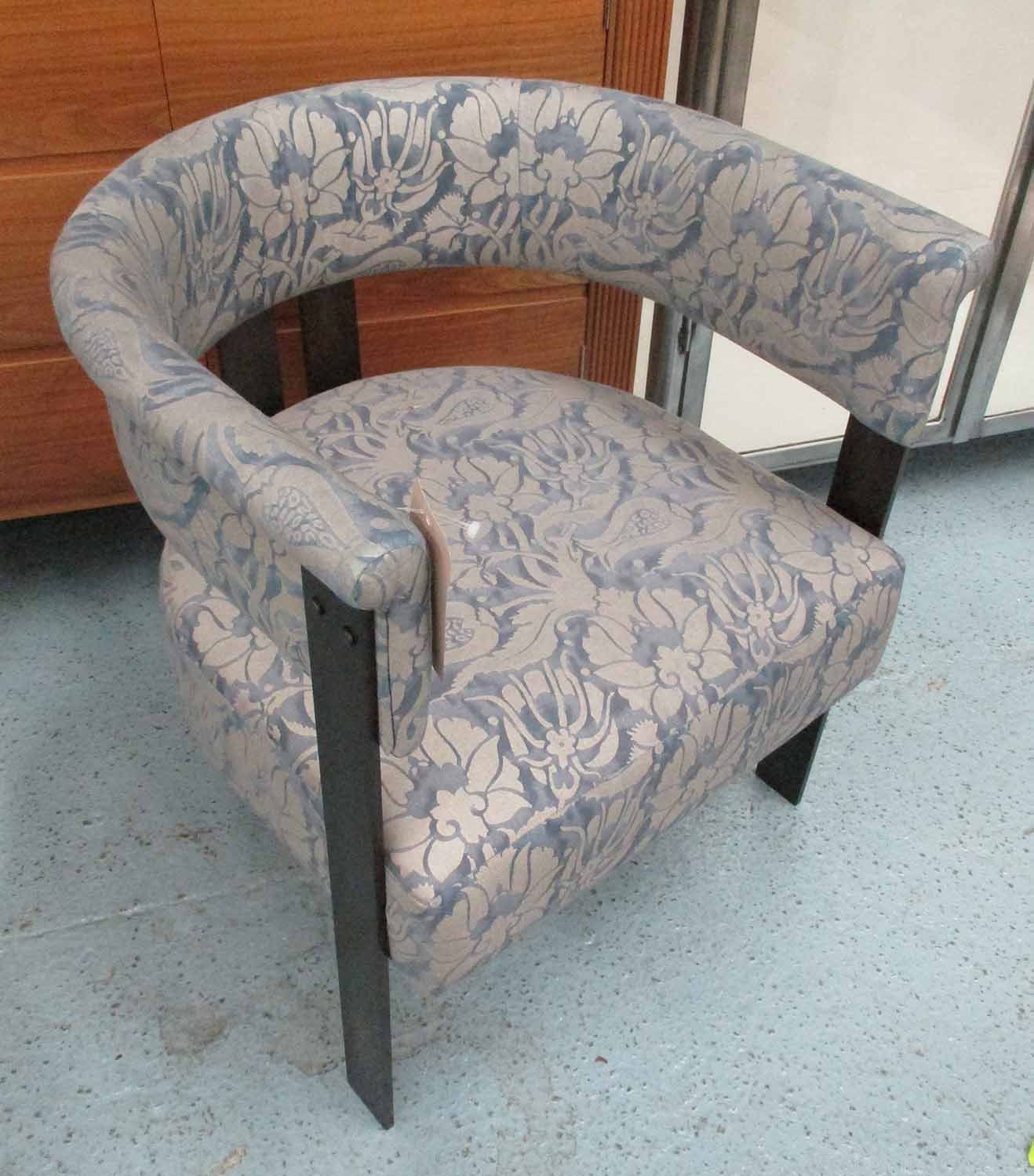 OPEN CLUB CHAIR, in a floral fabric on metal supports, 63cm W.