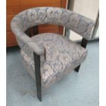 OPEN CLUB CHAIR, in a floral fabric on metal supports, 63cm W.