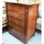 CHEST, of five drawers (oak lined) in a mahogany finish on turned front supports,