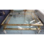 LOW TABLE, square form, having a bevelled glass inset top with lower tier in a brass frame,