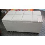 OTTOMAN, in a beige buttoned fabric with lift up lid on castors, 102cm x 51cm x 51cm H.