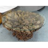 LOW TABLE, a circular glass top on a naturalistic twig style base, 75cm x 44cm H.