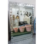 WALL MIRROR, with a faceted pyramid shaped border and a rectangular bevelled plate,