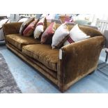 SOFA, of large proportions in chocolate brown velvet, 251cm W x 79cm H x 113cm D.