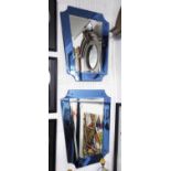 WALL MIRRORS, a pair, Art Deco style, with a blue coloured border and a central bevelled plate,