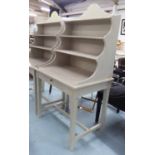 DESK, in the French provincial manner with waterfall shelves, with a grey painted finish, 162cm H.