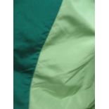 CURTAINS, a pair in bottle green and light green silk lined and interlined,