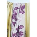 CURTAINS, a pair, in a purple flower design on a cream ground lined, gathered 115cm x 230cm drop.