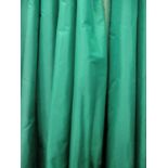 CURTAINS, a pair in bottle green silk, lined and interlined, gathered 76cm W x 218cm drop.