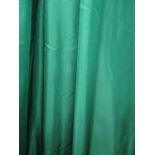 CURTAINS, a pair in bottle green and light green silk lined and interlined,