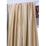 CURTAINS, a pair, in gold silk lined and interlined, gathered 90cm x 277cm drop.