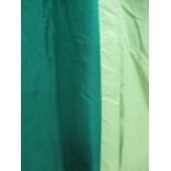 CURTAINS, a pair in bottle green and light green silk lined and interlined,