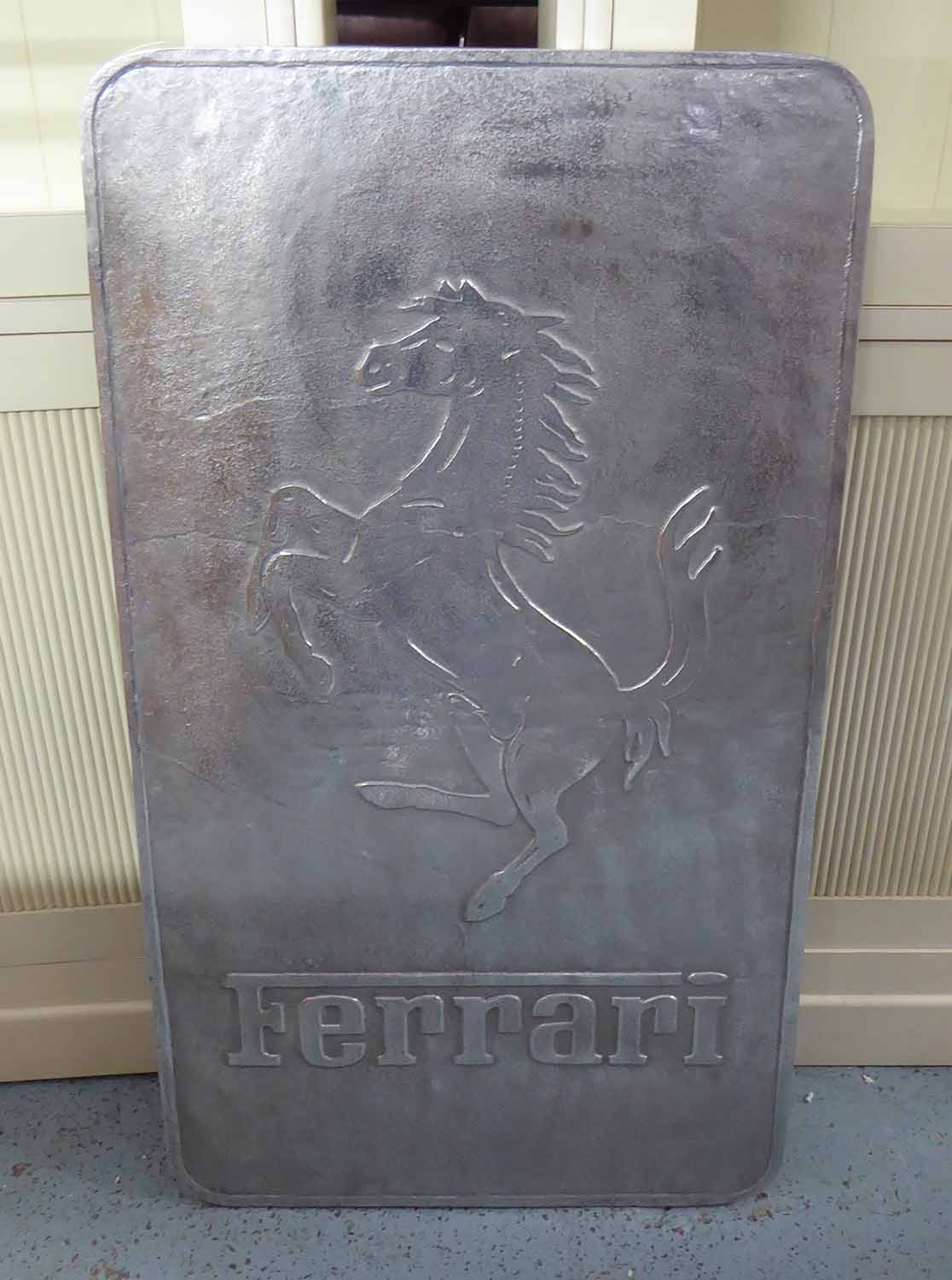 FERRARI WALL SIGN, in metal, 99cm x 56cm.