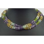 BUCCELLATI STYLE, a pair of vintage aquamarine, peridot, citrine and amethyst bead necklaces,