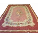 SAVONNERIE STYLE NEEDLEPOINT CARPET, 356cm x 235cm.