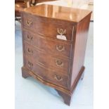 BEDSIDE CHESTS, a pair, George III design, each serpentine fronted, with four drawers,