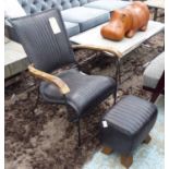 OPEN ARMCHAIR, in black leather on a metal frame with matching footstool, 66cm H.