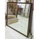 WALL MIRROR, square ebonised bevelled mirror, incised and gilt stars,