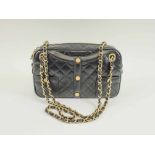 CHANEL 'JACKET' HANDBAG, iconic quilted black leather with gold tone hardware, zip top closure,