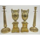 CLASSICAL BRASS URNS ON PLINTHS, a pair, 19th century,