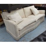 SOFA, two seater, in beige fabric with bullion fringe on turned supports, 223cm L.