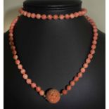 CORAL BLAD AND GOLD LONG NECKLACE, approx 72cm L, 42 gramms.